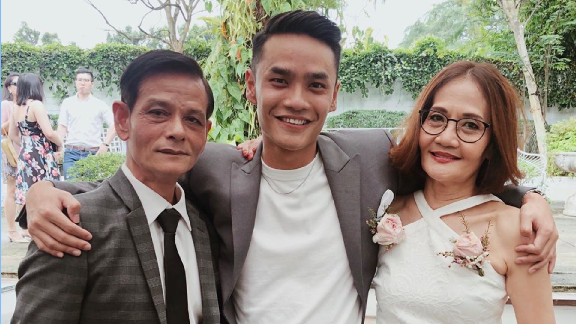 Derrick Wee (middle) tells us about the importance of sign language for his family.